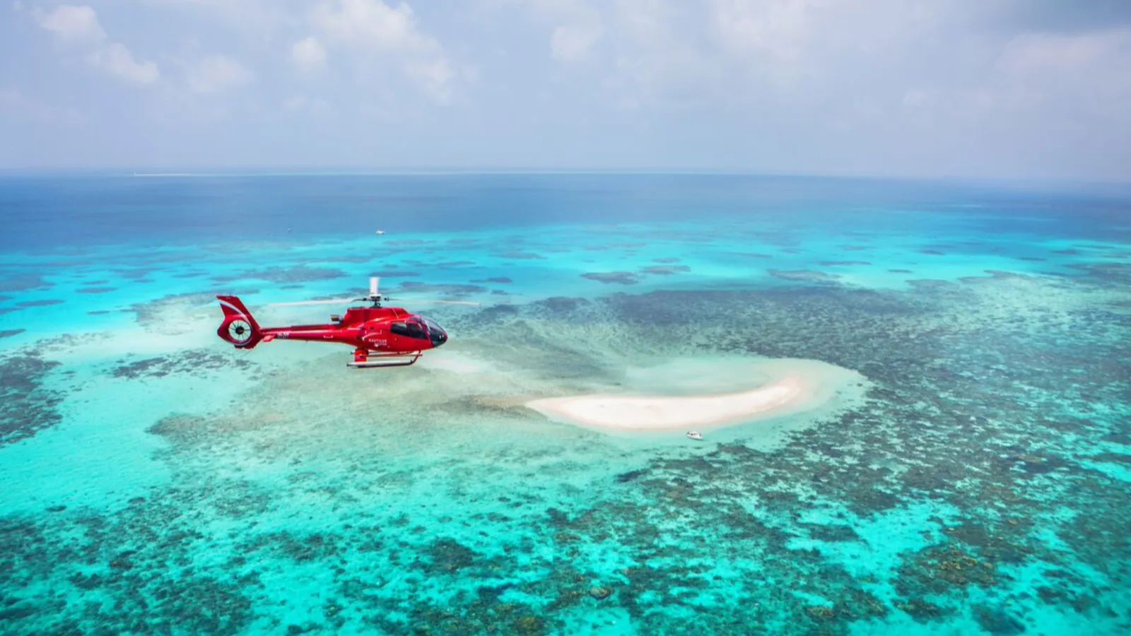 Helicopter over a reef cay