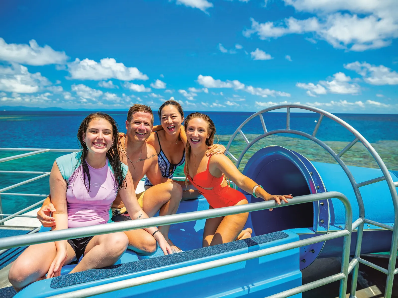 Guests at the bottom of the pontoon water slide