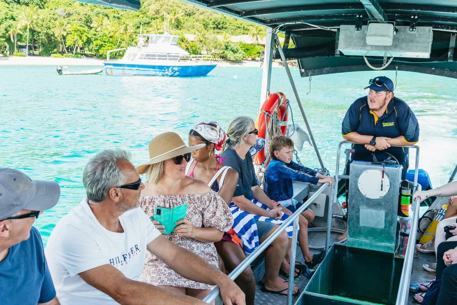 Guests boarding a glass-bottom boat