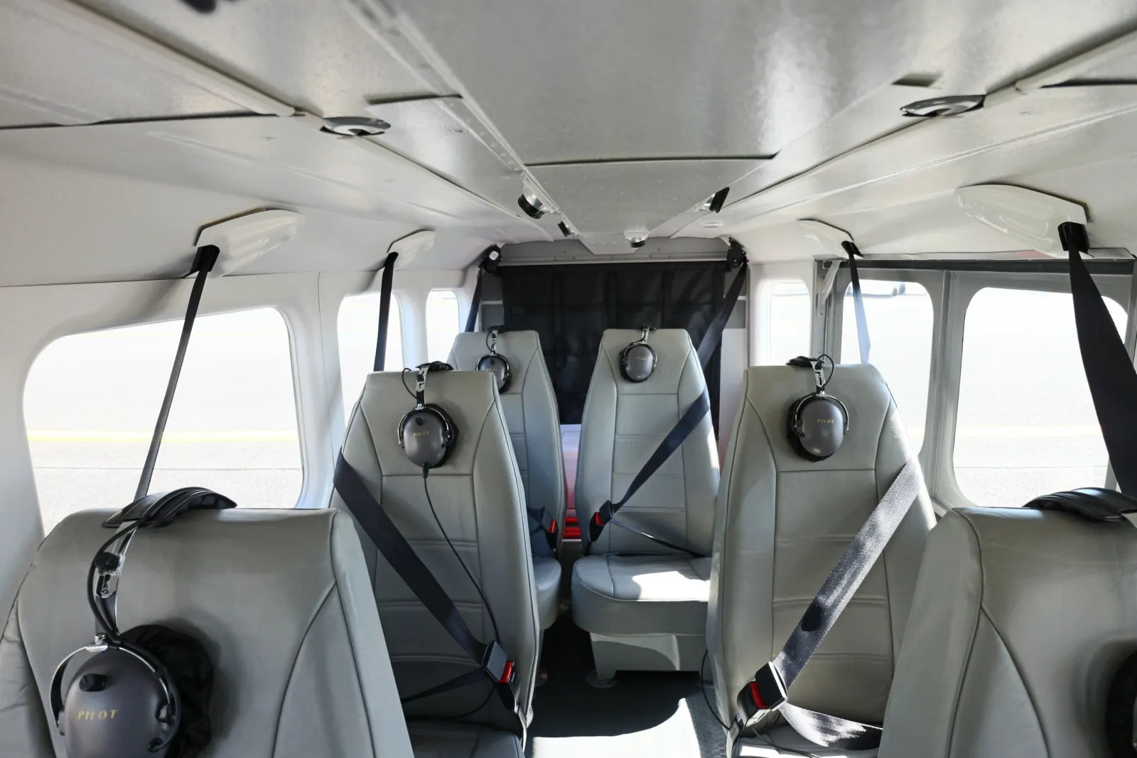Cabin of the light aircraft with its window seats